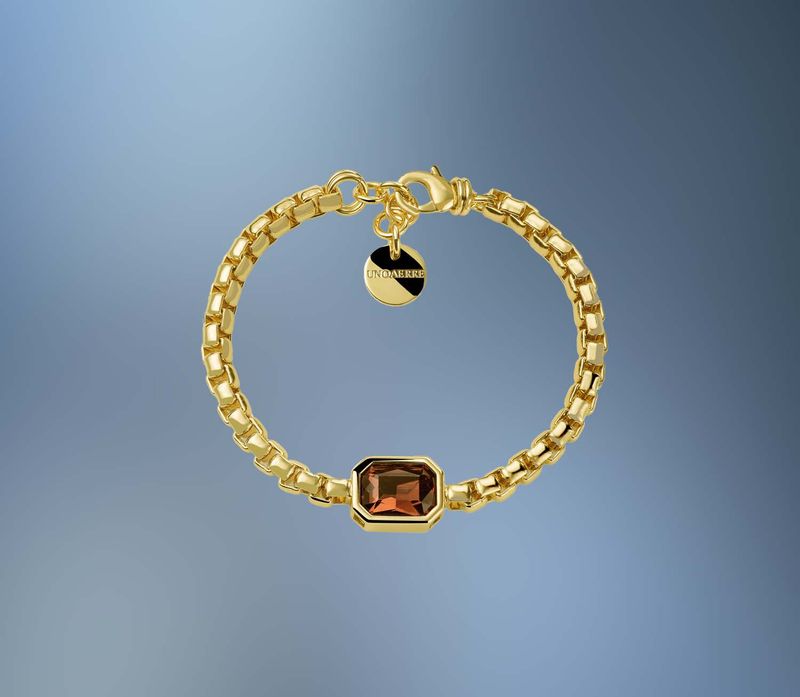 ONE BRONZE/24KT OVERLAY 7.5 ONE BRONZE/24KT OVERLAY 7.5" FANCY LINK BRACELET WITH A PURPLE CRYSTAL