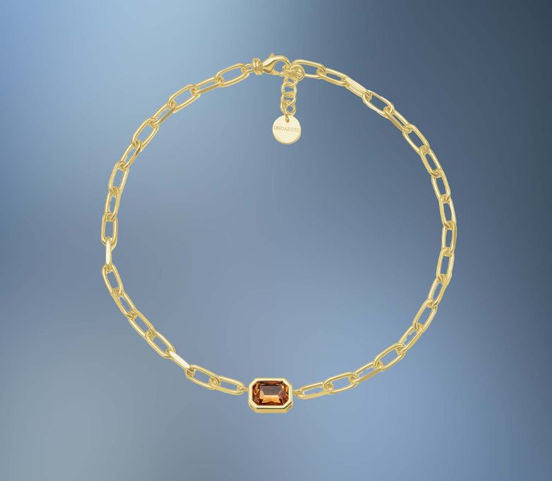 ONE BRONZE/24KT OVERLAY PAPERCLIP CHAIN WITH AN ORANGE CRYSTAL ONE BRONZE/24KT OVERLAY PAPERCLIP CHAIN WITH AN ORANGE CRYSTAL