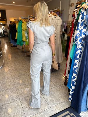 Khaki or grey  linen jumpsuit with belt.