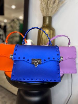 SHOULDER BAG WITH STUDS IN PURPLE,BLUE AND ORANGE