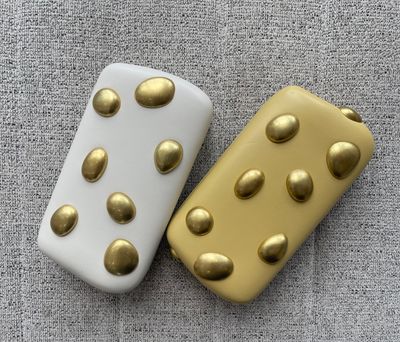 Mustard or ivory detailed clutch