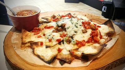 NACHOS with Parsley Sauce, Pebre Salsa, Veggies, Cheese &amp; Protein by Choice. Meat &amp; Vegetarian