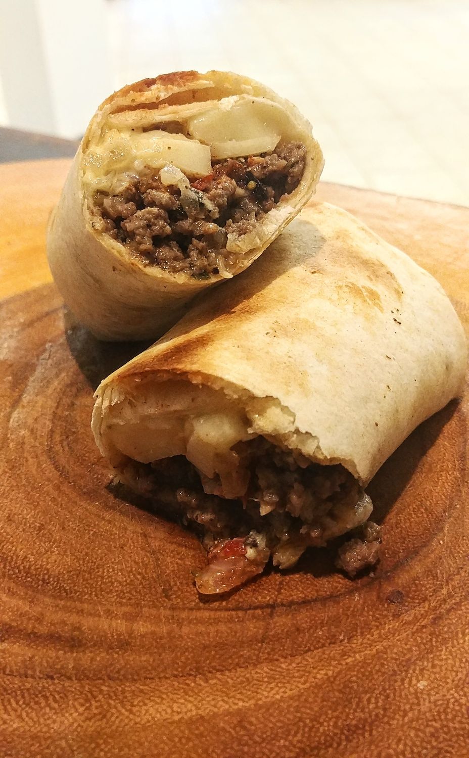 The Wrap of Pleasure by Deniz - Beef, Caramelized Onions, Salsa, Cheese, Mayo. The Wrap of Pleasure by Deniz - Beef, Caramelized Onions, Salsa, Cheese, Mayo.