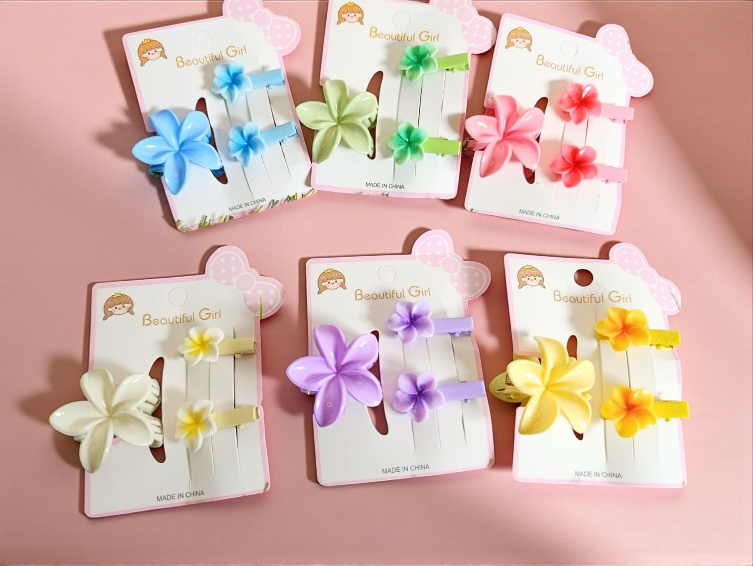 Docena pinza Mini y Pasadores flor Hawaiiana