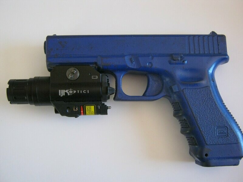 Green laser/illuminator
Mountable on pistol with rail.