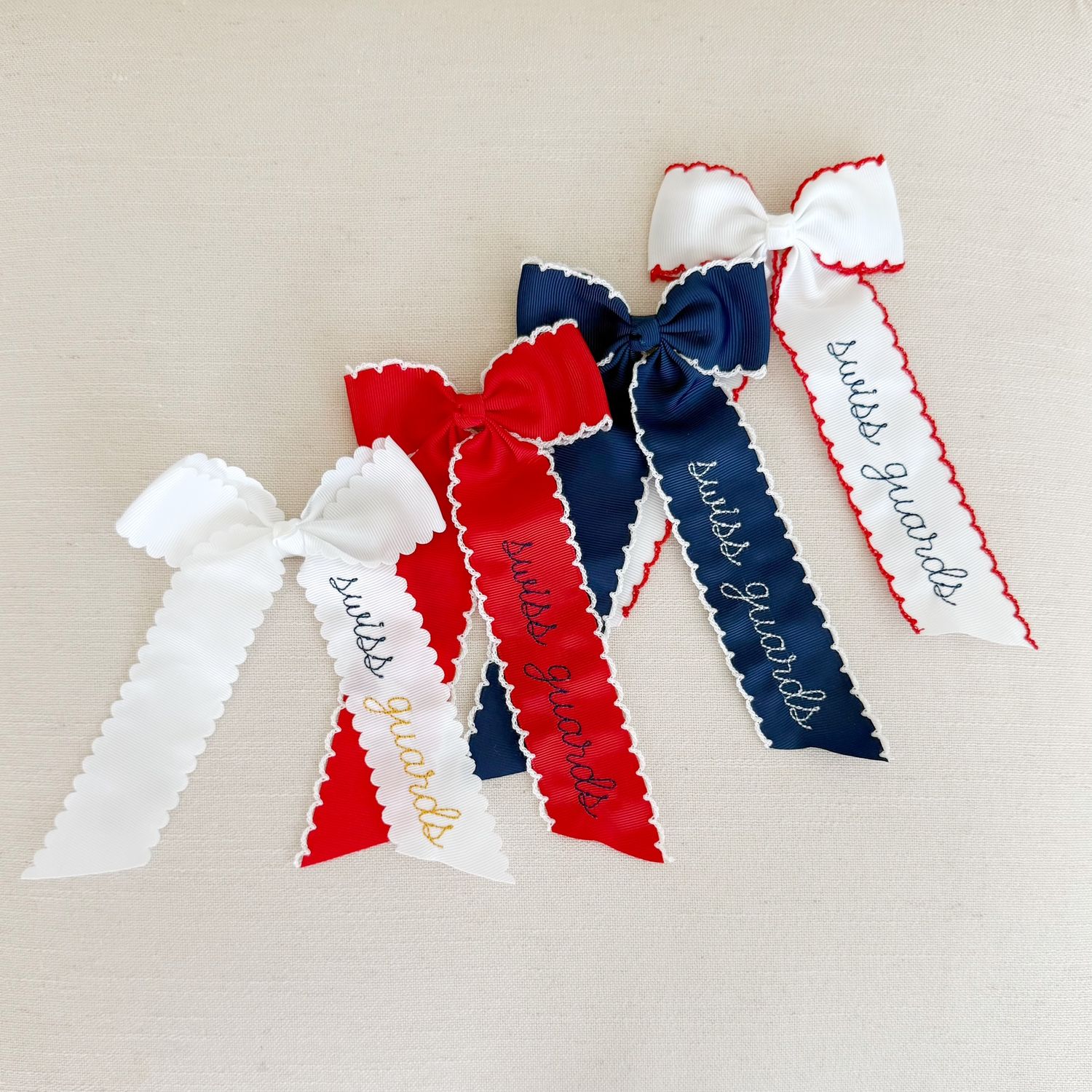 White Bow with Red Moonstitch