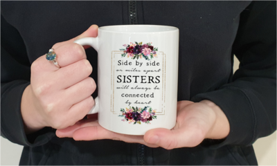 Side by side or miles apart Sisters will always be connected by heart- mug