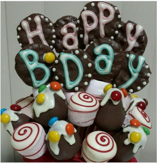 Arreglo de frutas y dulces