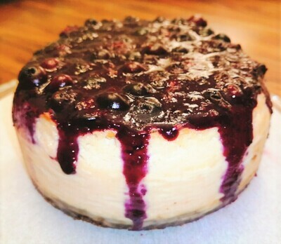 Vegan baked cheesecake with home made fruit compote. GLUTEN FREE.