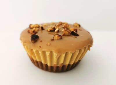 Vegan mini pumpkin cheesecake with caramel sauce and crushed pecans. GLUTEN FREE available.