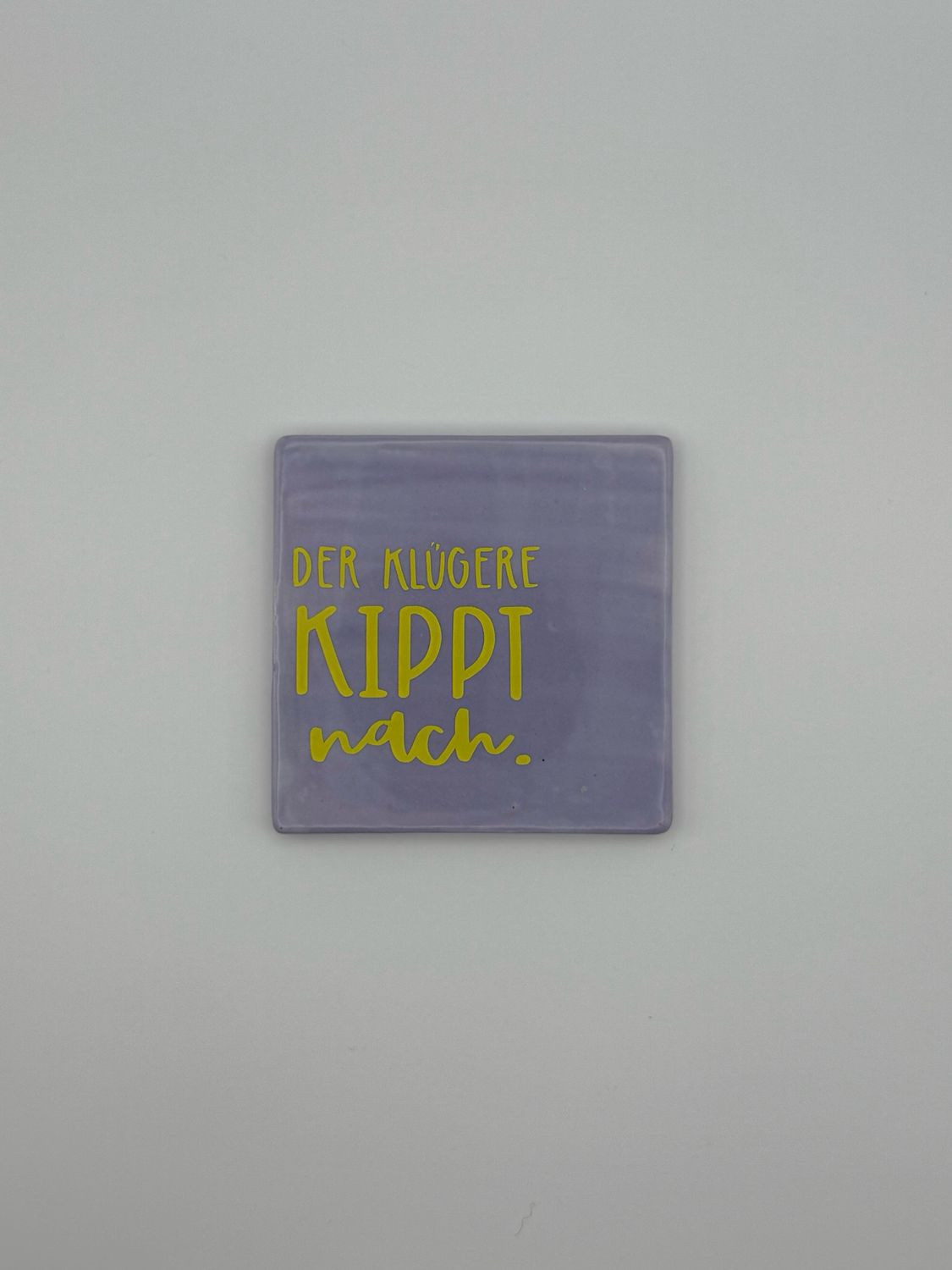 Sprichwortkachel „der Klügere kippt nach“