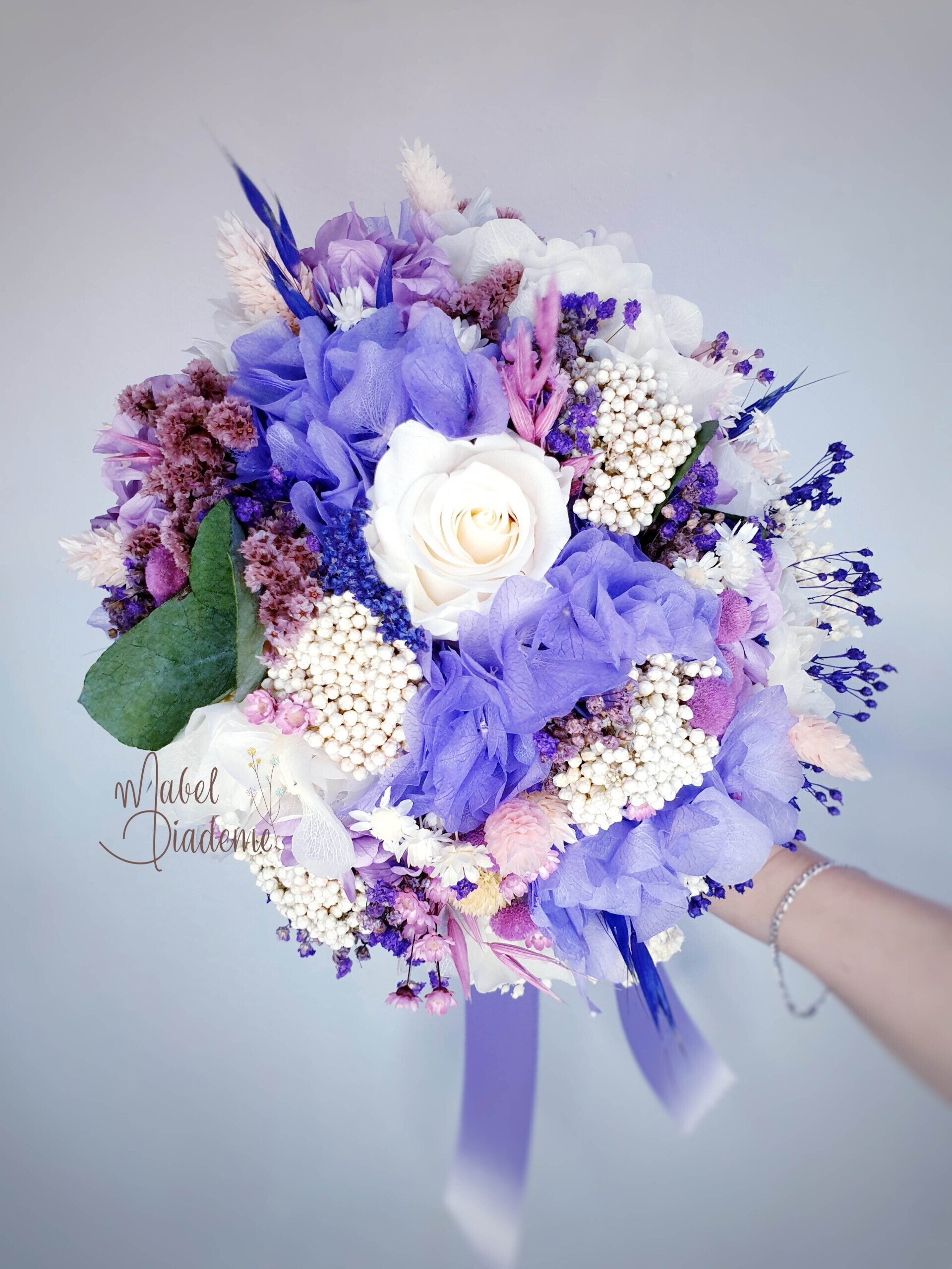 Ramo de novia bouquet tonos lila y malva flores preservadas