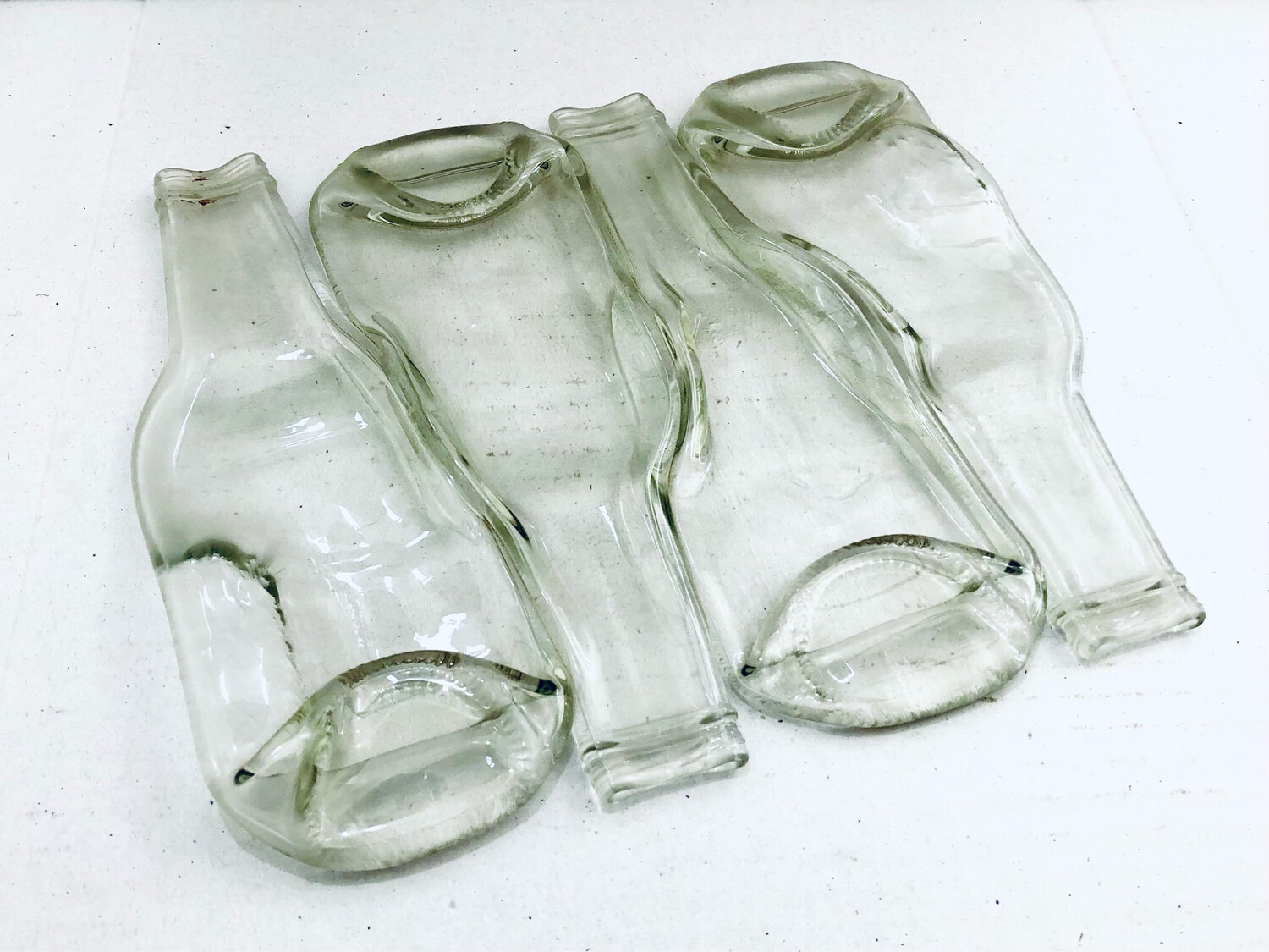 4 Clear Bottles / ٤ زجاجات شفافة