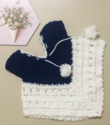 White and blue poncho