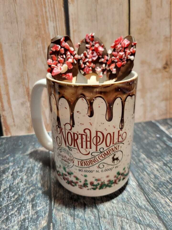 North Pole Mugs come with chocolate covered spoons