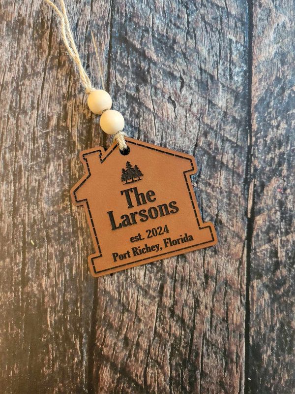 Personalized Bamboo Paddle Cutting Board with Custom House-Shaped Leather Ornament