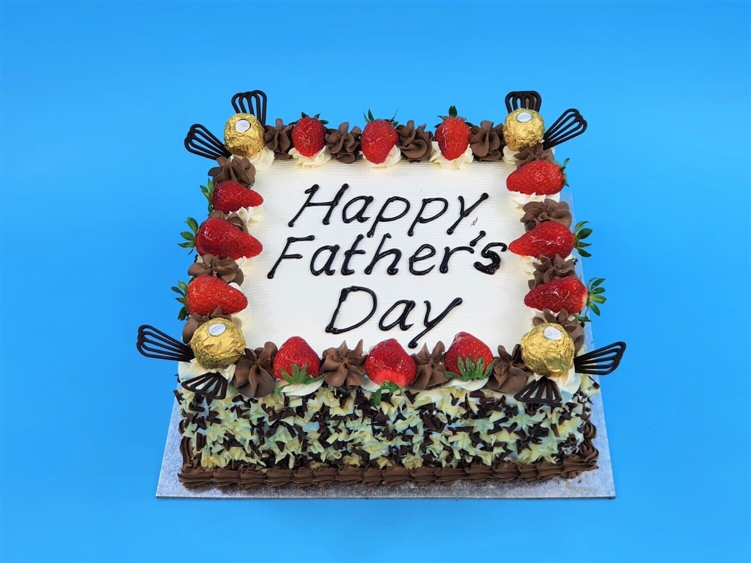 Ferrero & Strawberry's With Chocolate Curls On Side Fathers day Cake