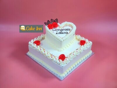 Flower With Heart On Top Tier Cake