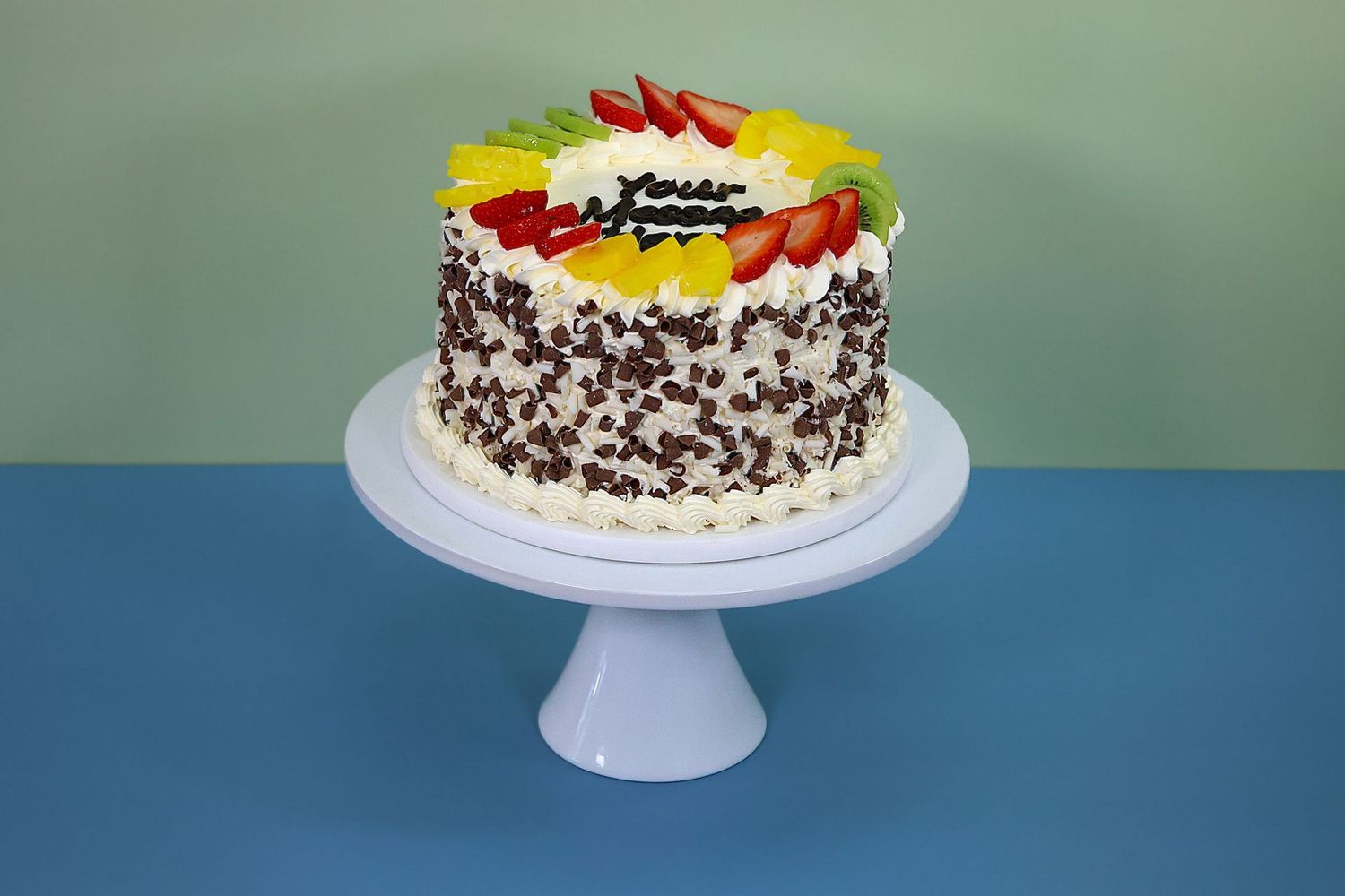 Fresh Fruit & Chocolate curls on side Birthday Cake