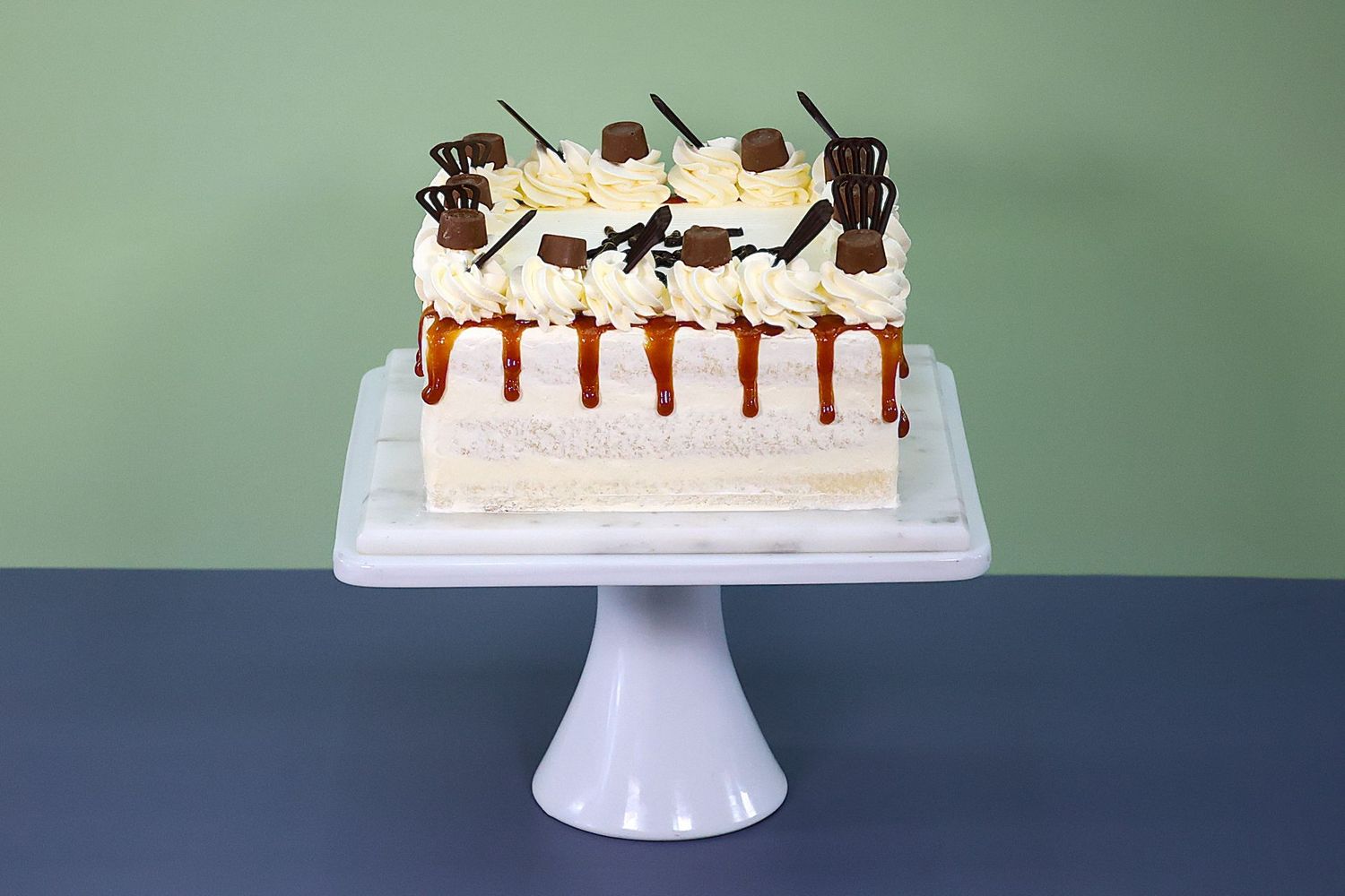 Caramel Dripping With Rolo Naked Cake