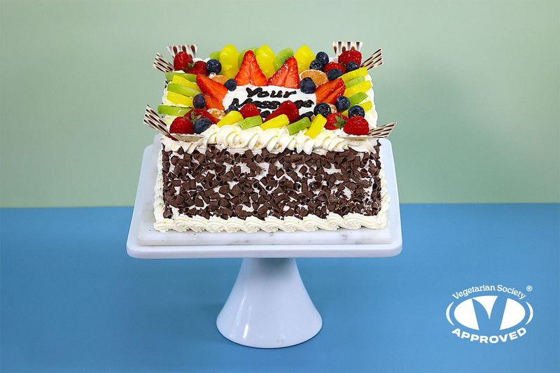 Fresh Fruit With Chocolate Curls On Side Birthday Cake