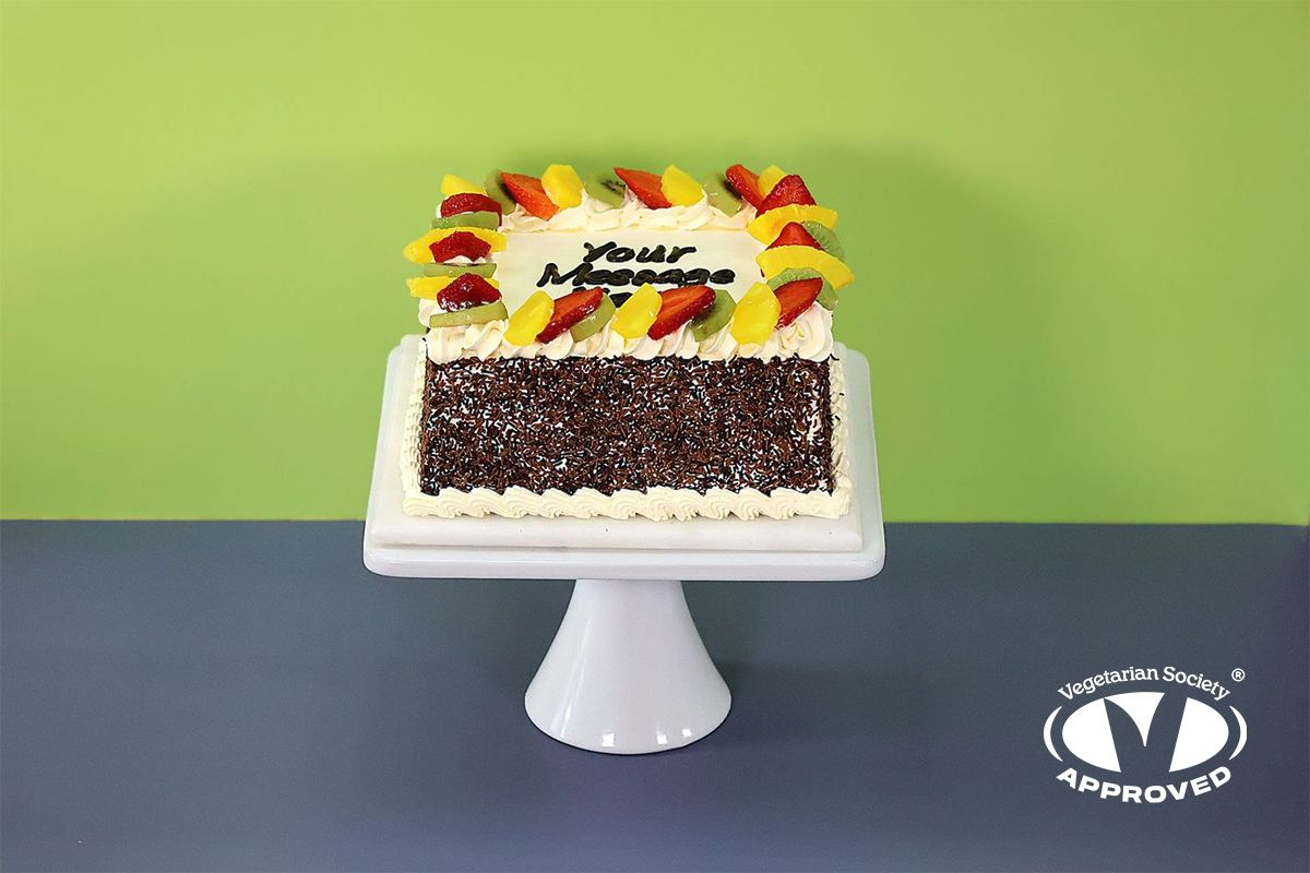 Fresh Fruit With Chocolate Sprinkle's On Side Birthday Cake