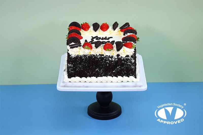 Strawberry & Oreo toppings With Oreo Crumbs On Side Birthday Cake