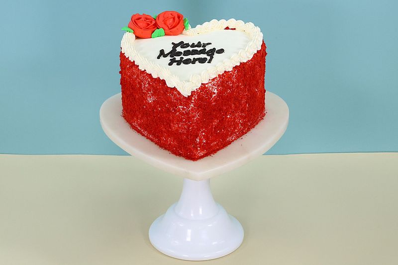 Red Flowers With Red Velvet Crumbs On Side Red Velvet Heart Cake