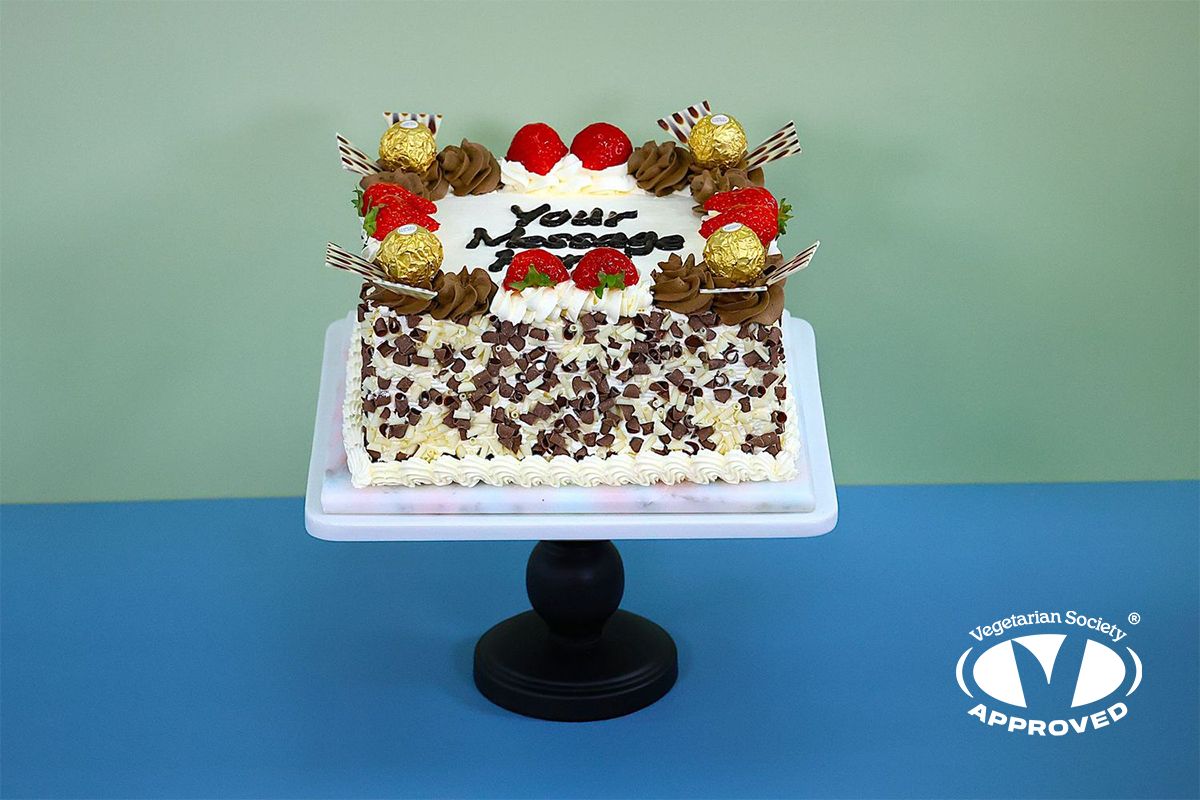 Fresh Fruit & Ferrero Toppings Chocolate With Chocolate Curls On Side Birthday Cake