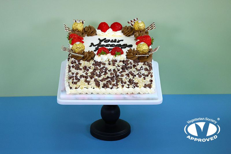 Ferrero & Strawberry Toppings With Chocolate Curls On Side Birthday Cake