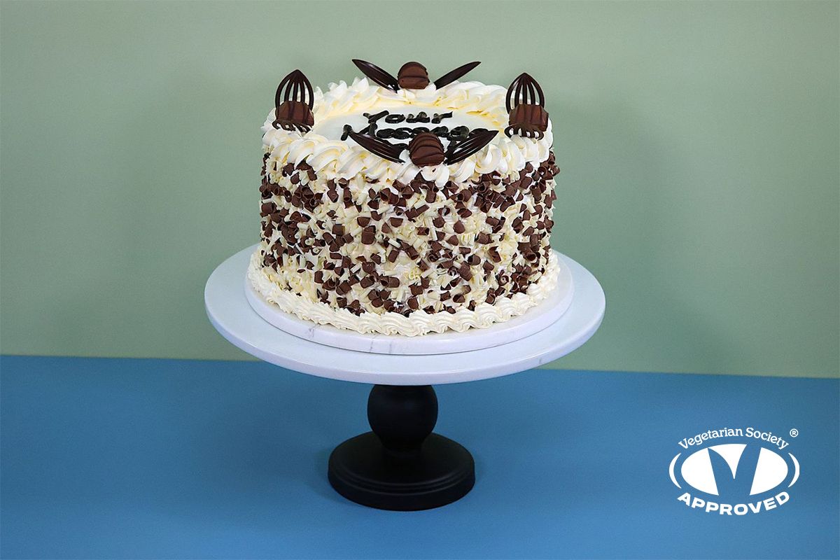 Kinder Bueno toppings With Chocolate Curls On Side Birthday Cake