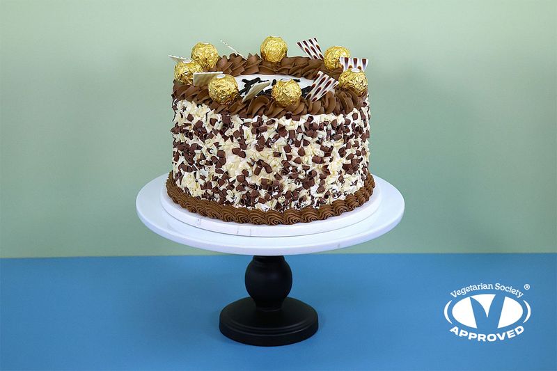 Ferrero topping &  Chocolate curls on side Birthday Cake