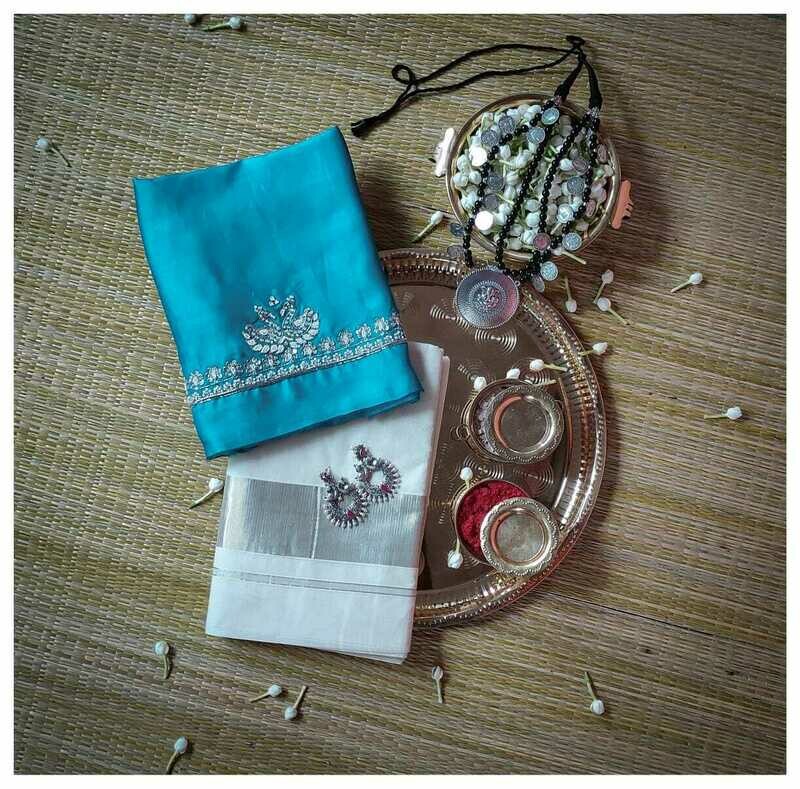 silver border set saree teamed up with pure Chanderi silk Handwork blouse
