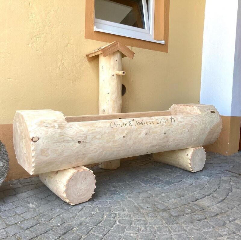 Holzbrunnen kaufen Baumstammbrunnen und Himmelsliegen für Ihren Garten