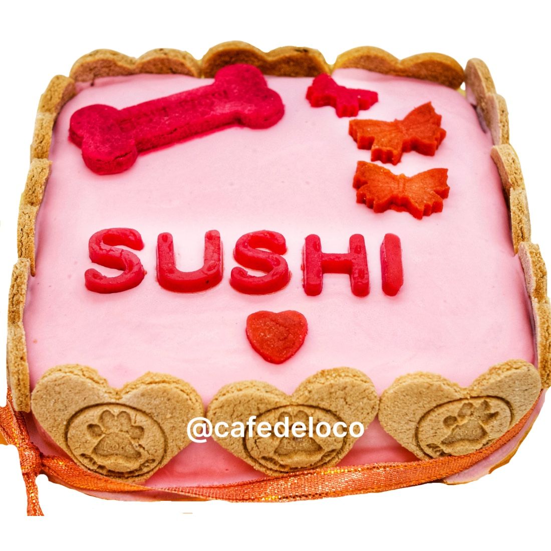 Square Icing dog cake with side cookies