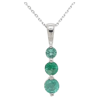 Pendant in 14k White Gold with a .65ct Triple Emerald