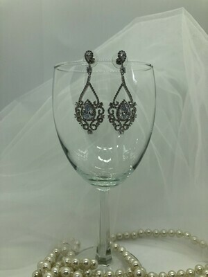 Beautiful Teardrop Pave Surround Swirl Earring