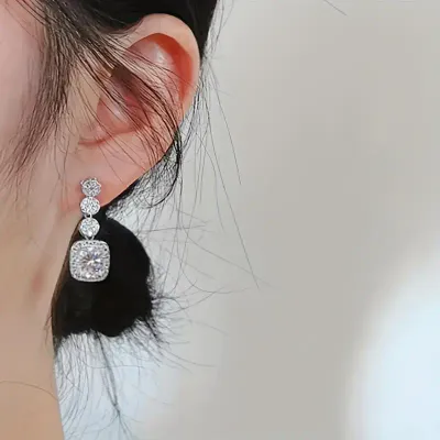 AAA CZ Cascading Round Stones with Emerald Cut Halo Bottom