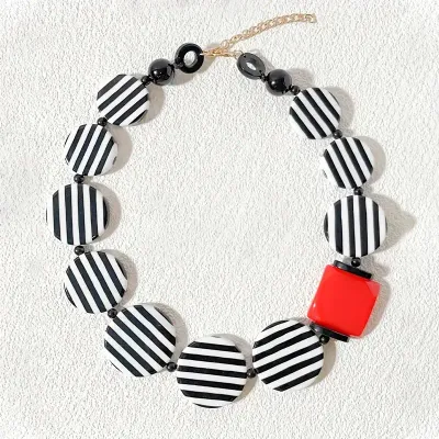 Black/White Striped Round Disc Necklace With A Touch of Red Black/White Striped Round Disc Necklace With A Touch of Red