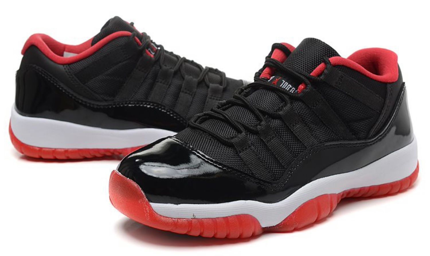 AIR JORDAN 11 LOW RETRO. “BRED” BLACK / RED / WHITE.