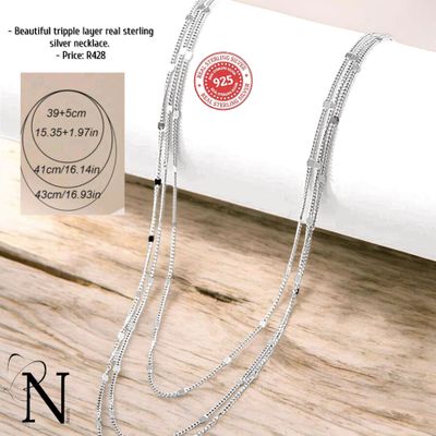 Real 925 sterling silver tripple layer necklace .