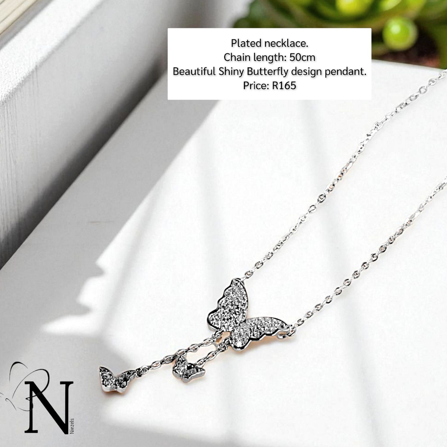 Silver plated necklace - Butterfly design.