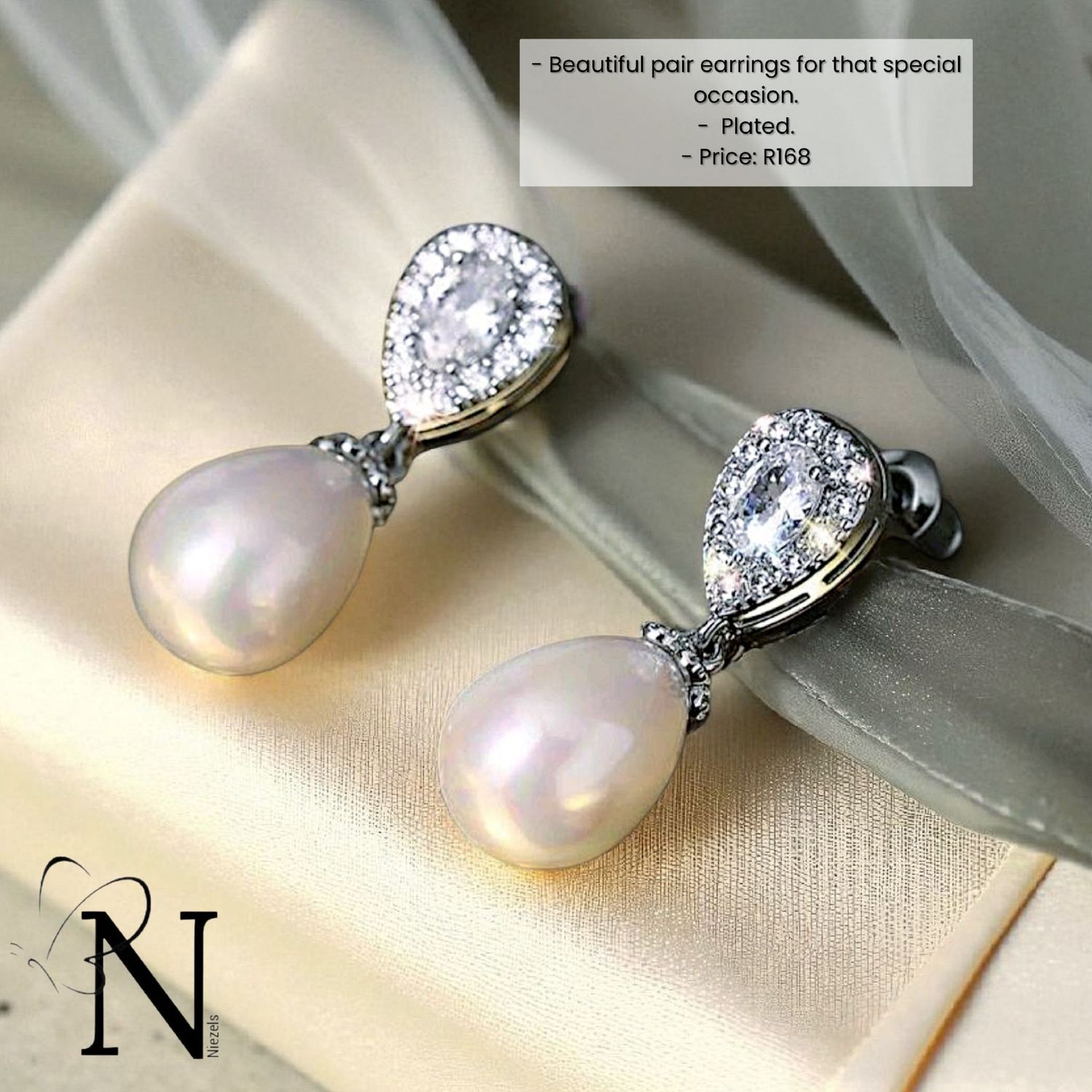 Silver plated earrings - Beautiful pearl drop design.