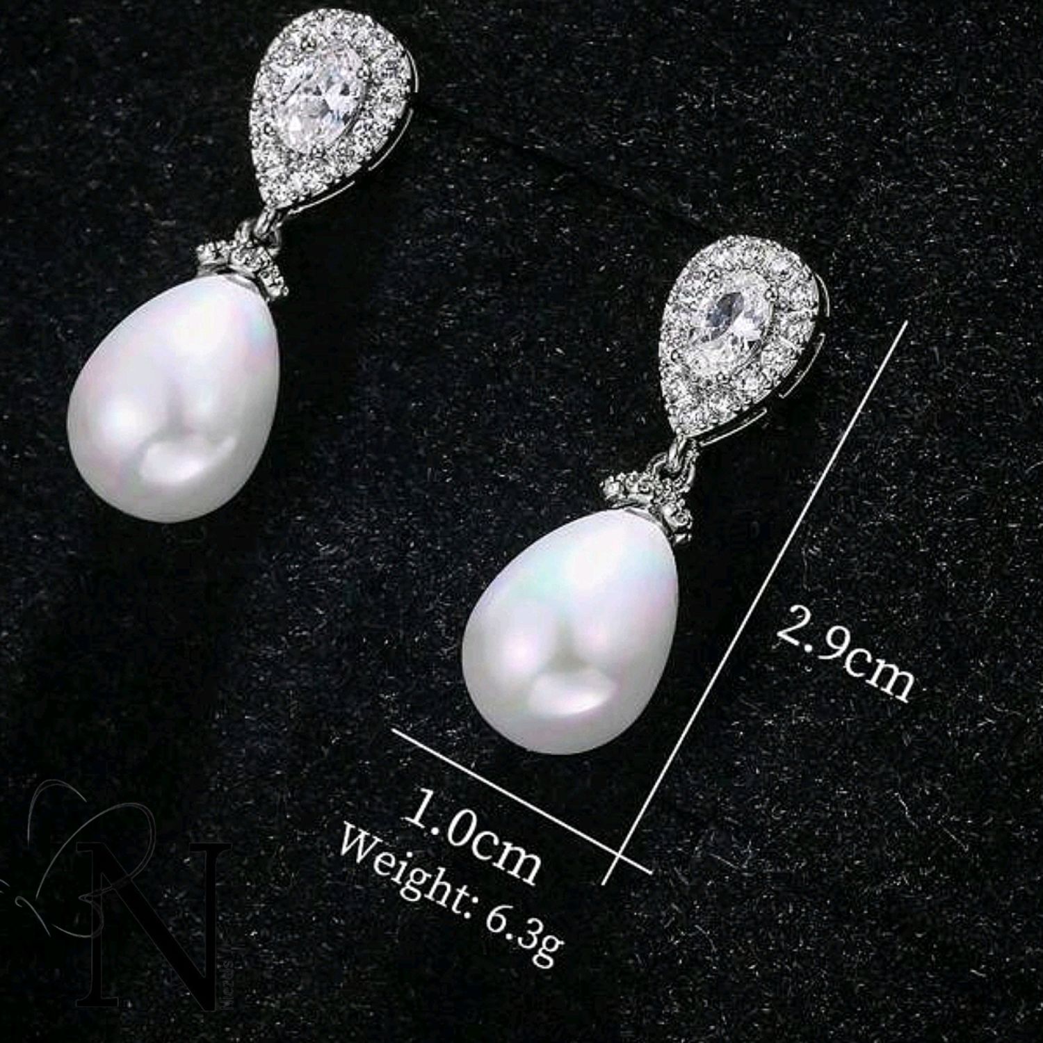 Silver plated earrings - Beautiful pearl drop design.