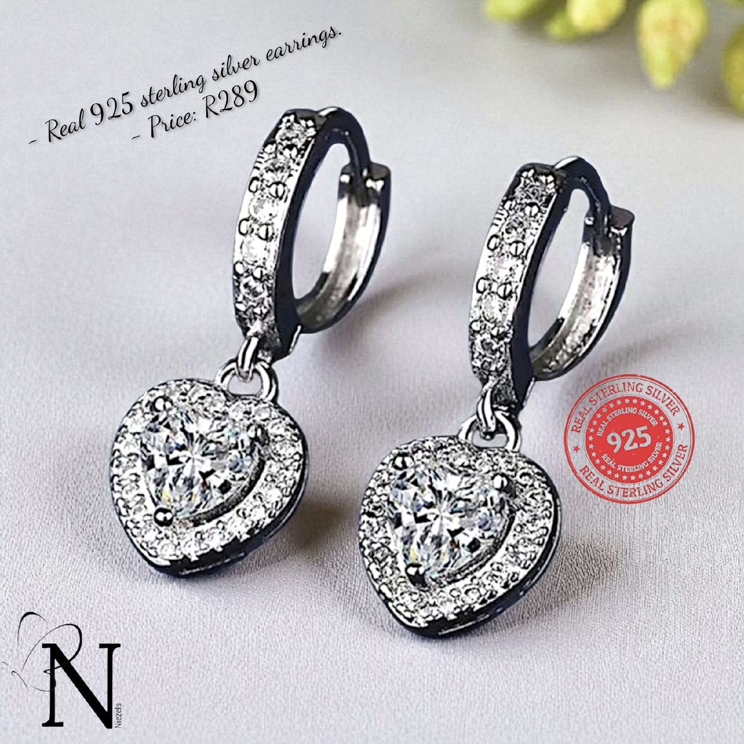 Real Sterling silver earrings- Beautiful shiny heart drop design.
