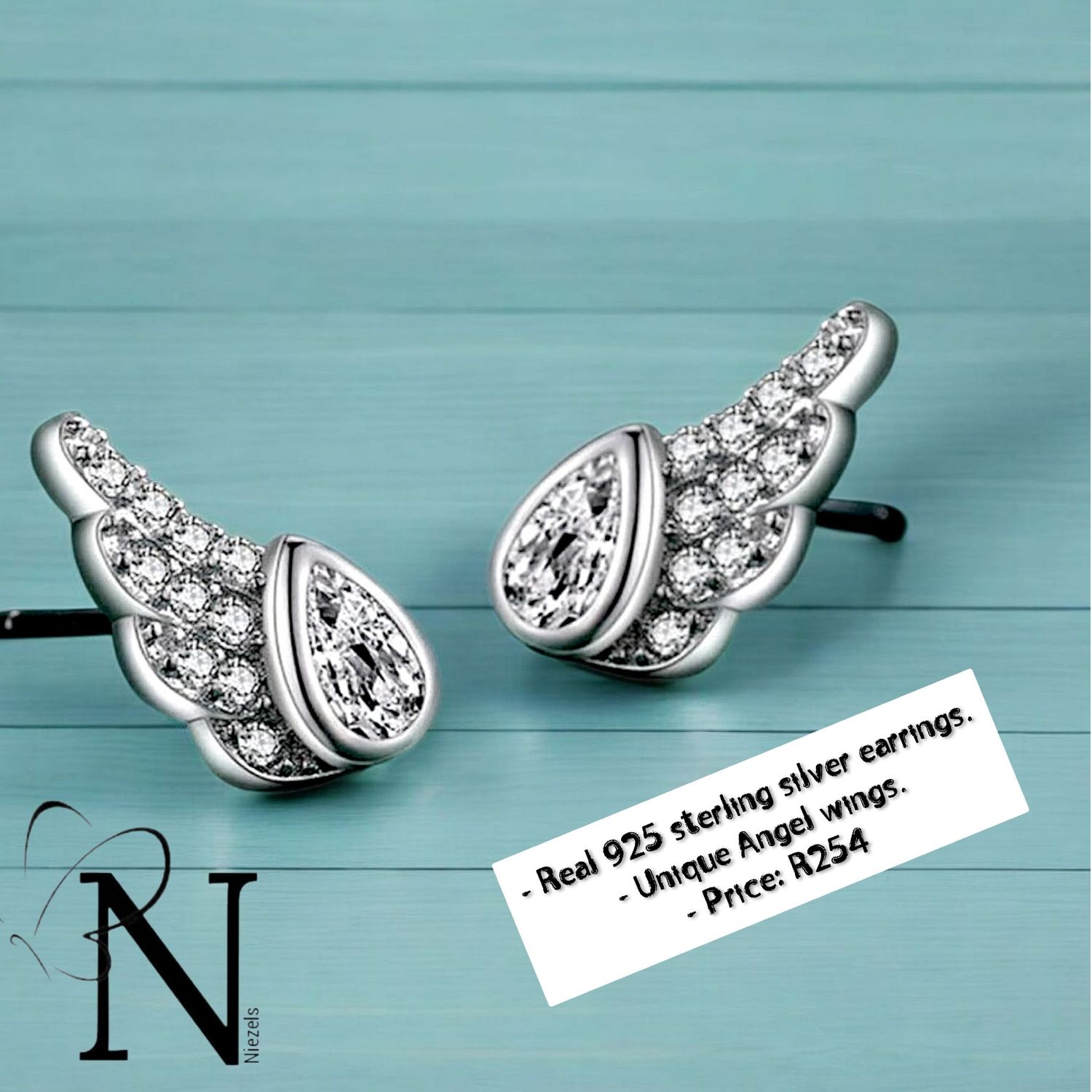 Real 925 sterling silver earrings- Shiny Angel wing studs.