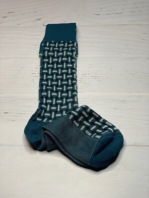 Calza unisex lunga con fantasia geometrica Calza unisex lunga con fantasia geometrica
