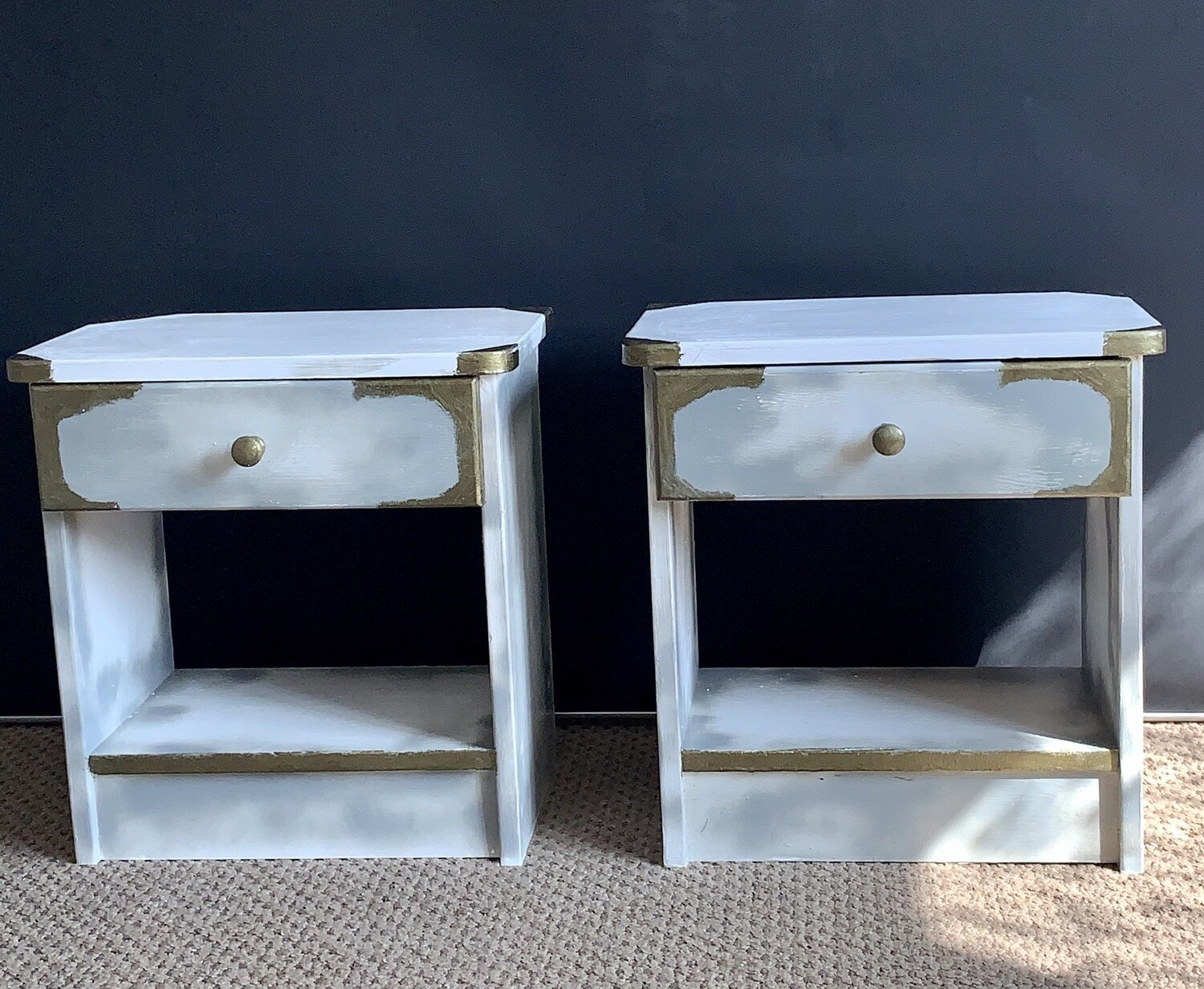 A Set Of Shabby chic bedside cabinets with draw white,winter grey, and Metallic gold.