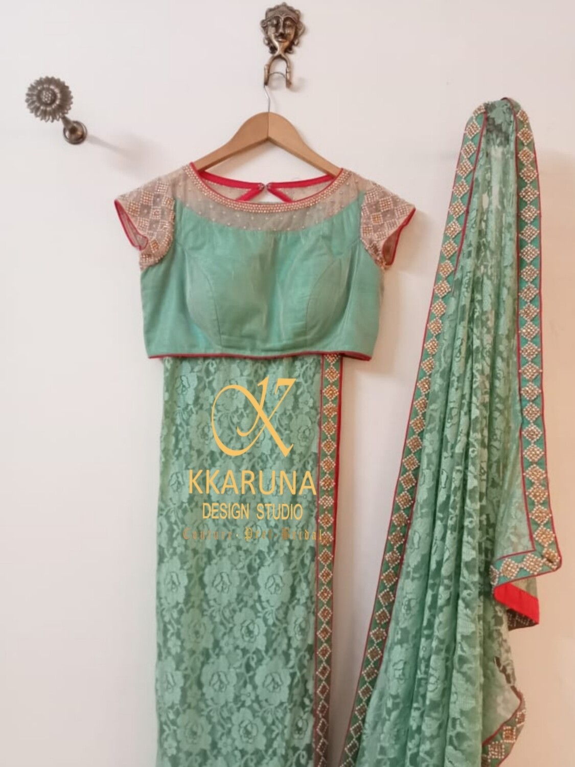 Beautiful Pista Green Saree with Pearl Embroidery on Borders and Designer Blouse