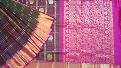 Olive green shade with orchid color kanchi saree comes along pink and gold border
